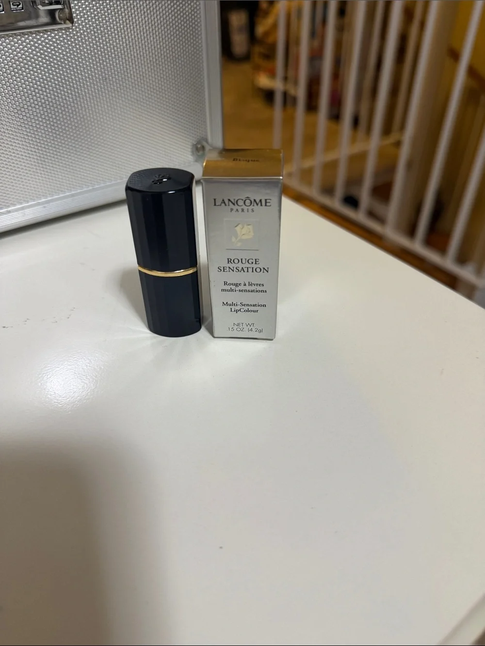 Lancôme Rouge Sensation Lipstick - Black & Gold Accents shade is called Bisque